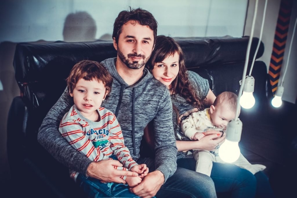 family sitting on a couch