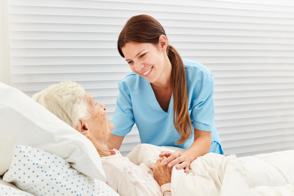 nurse entertaining a patient