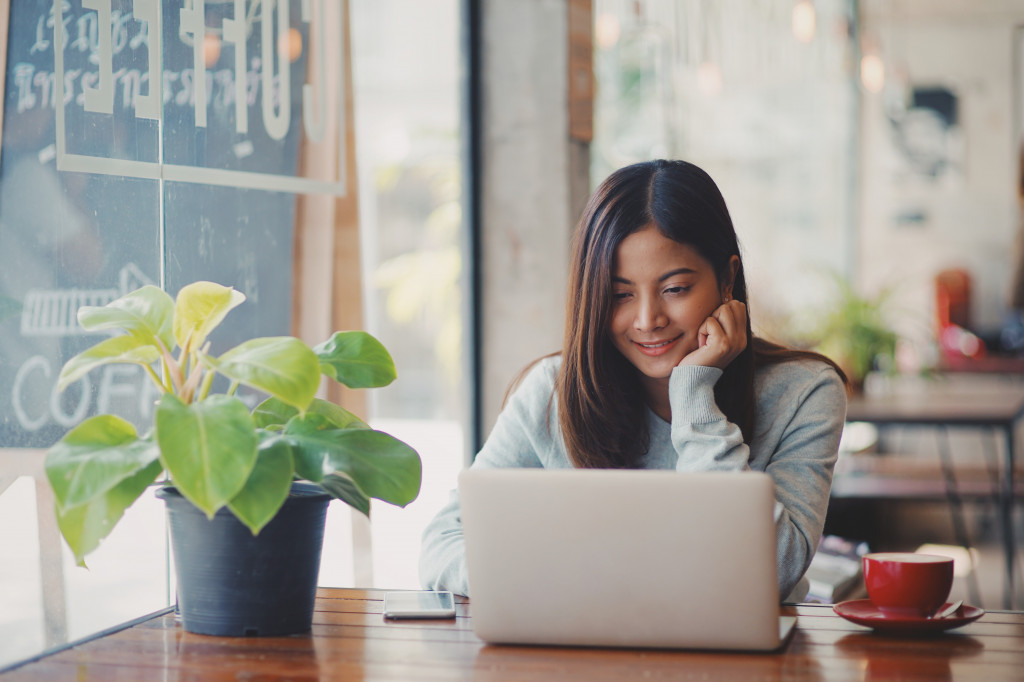 woman happily working