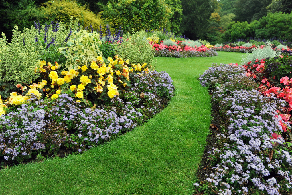 olourful Flowerbeds and Winding Grass Pathway in an Attractive English Formal Garden