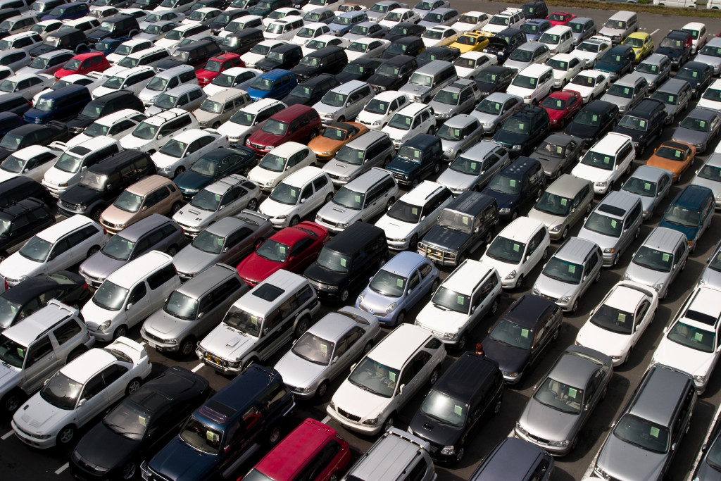 Many cars parked in the parking lot