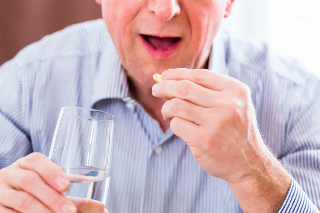 A person drinking anxiety medication