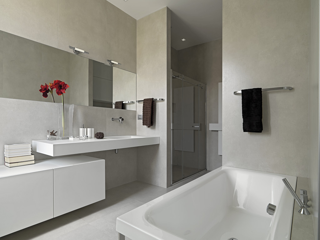 Modern luxury bathroom with small towel and a flower