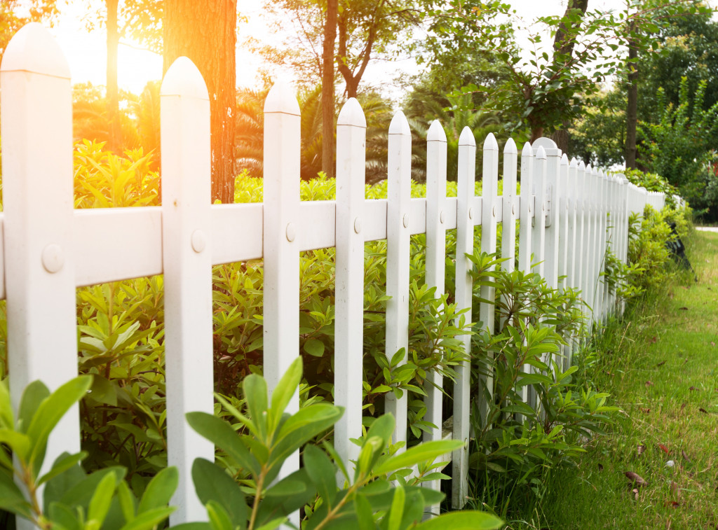 A country style wooden fence in a yard