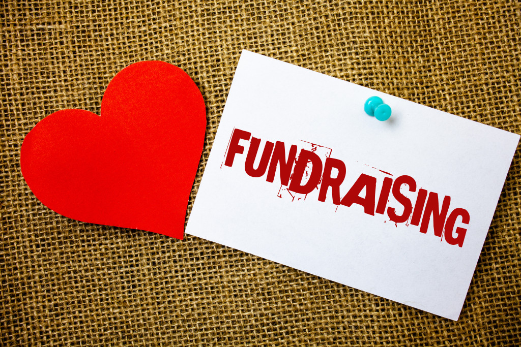 The word fundraising written on a paper