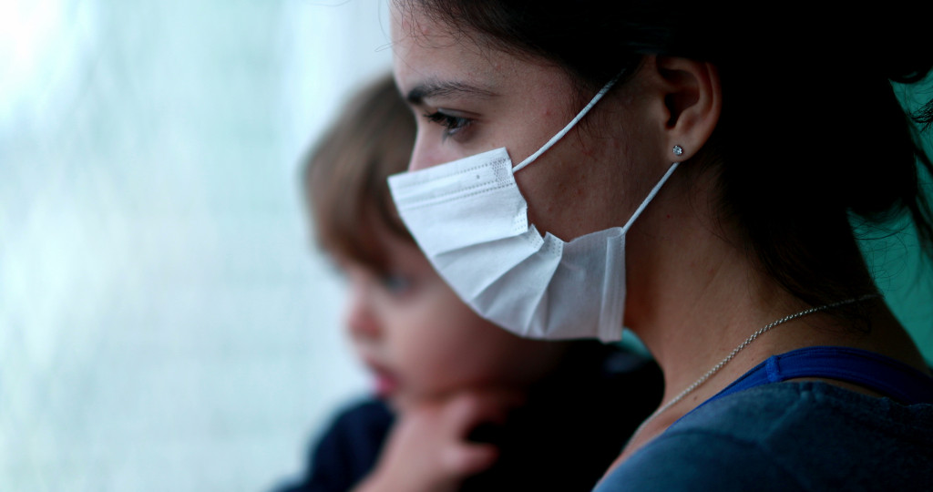 a woman wearing a face mask