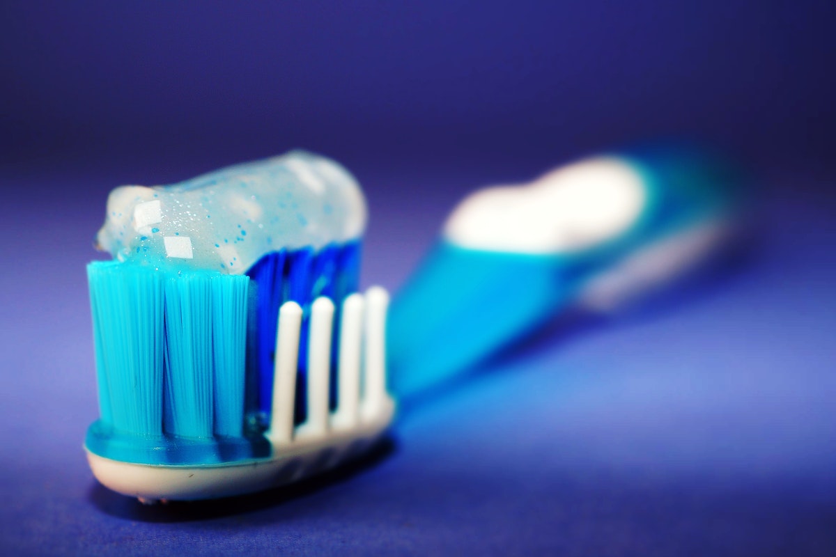 Closeup and Selective Focus Photography of Toothbrush With Toothpaste