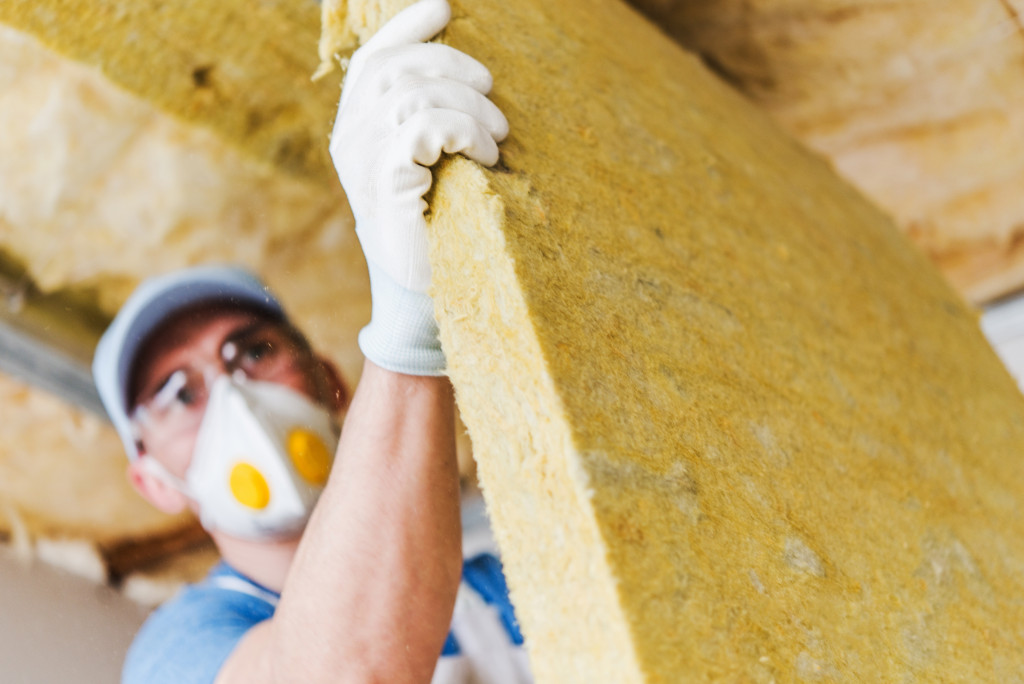 Installing insulation on home