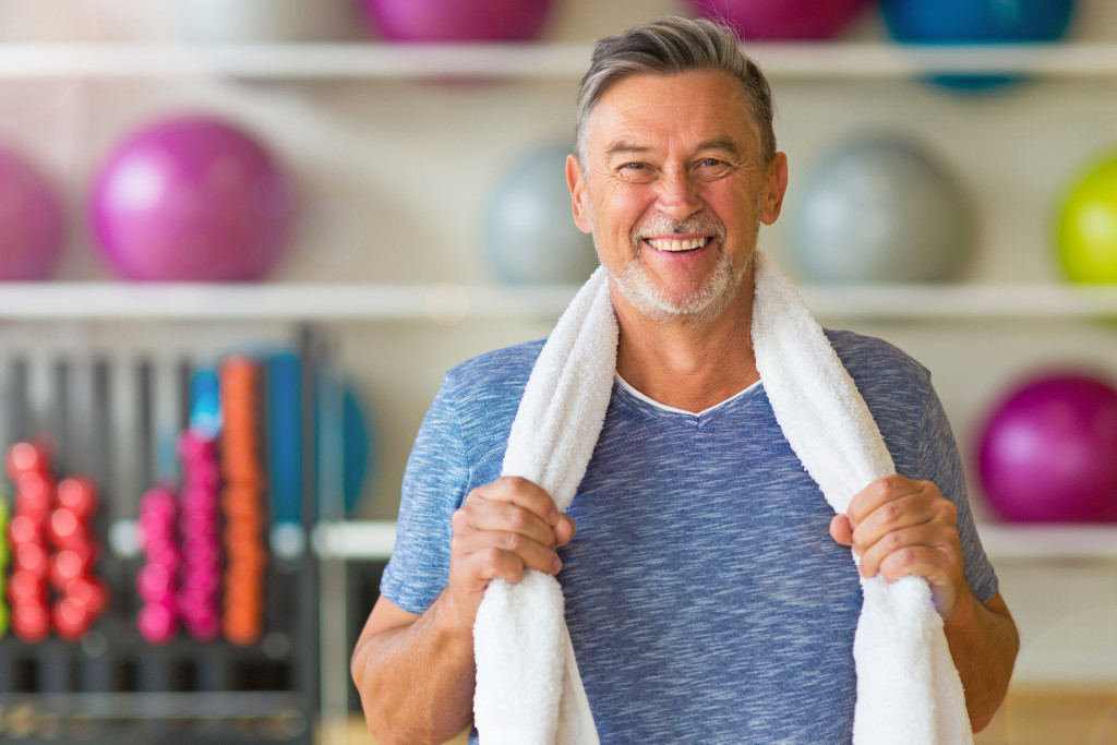 happy aging man after exercise